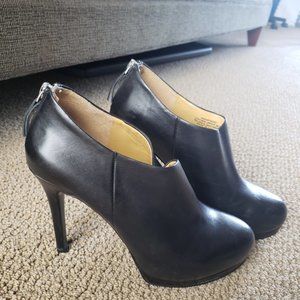 High heel shoe boots